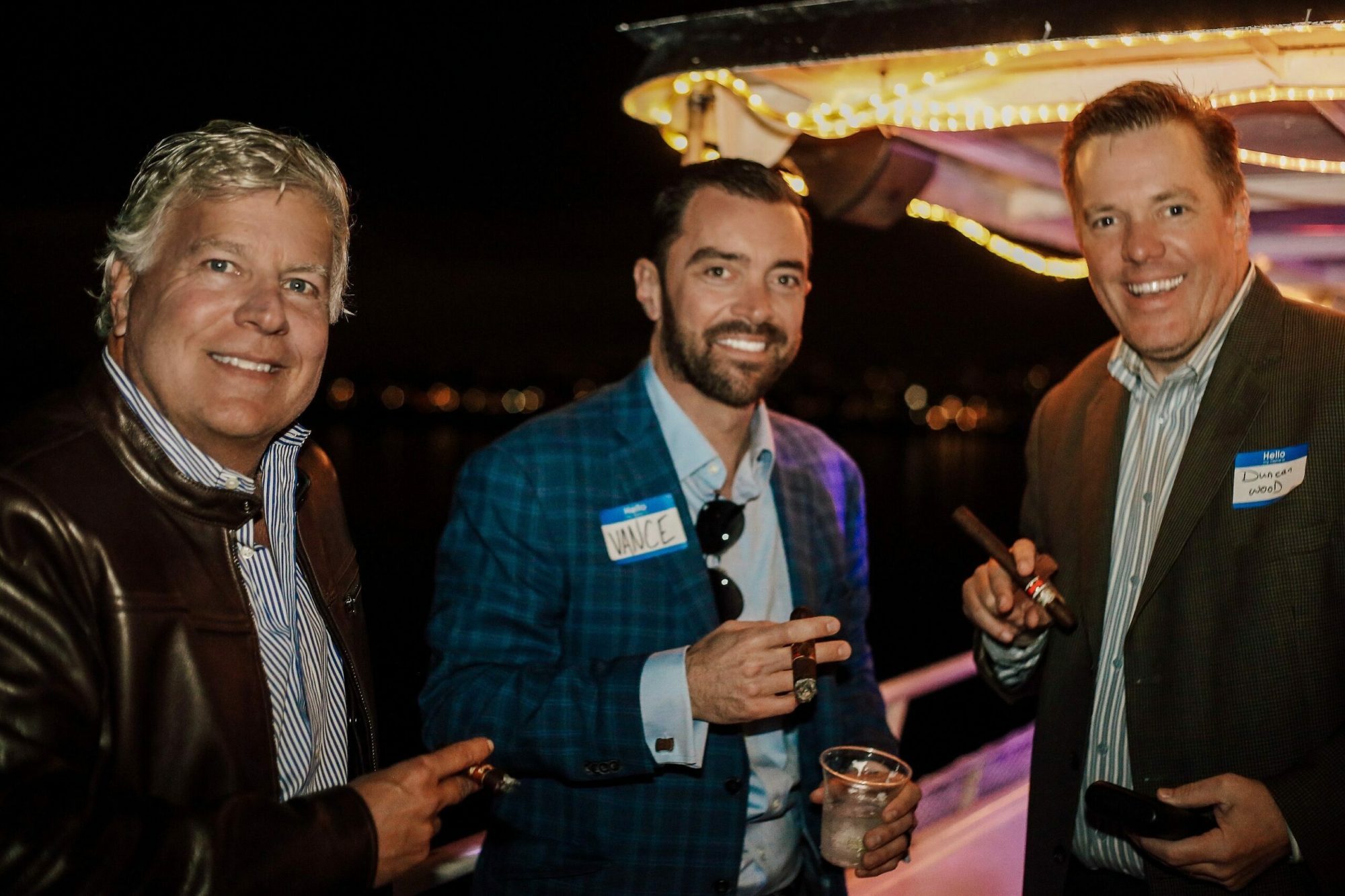Corporate Events a group of people holding wine glasses