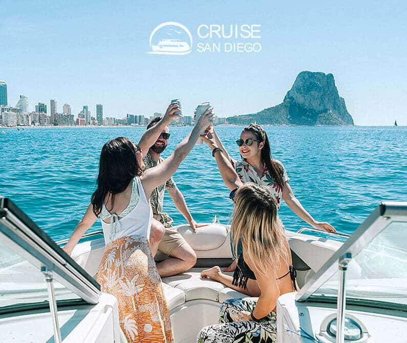Why have your Bachelorette party on a boat a group of people sitting in front of a body of water, Party Boat Rentals San Diego