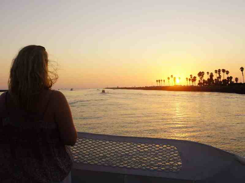 a person standing in front of a body of water