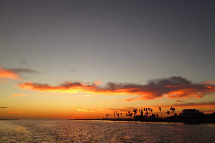 a sunset over a body of water