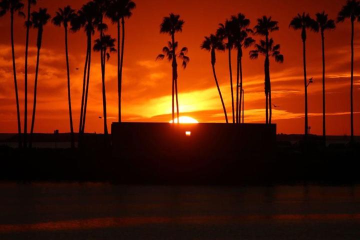 a sunset over a body of water