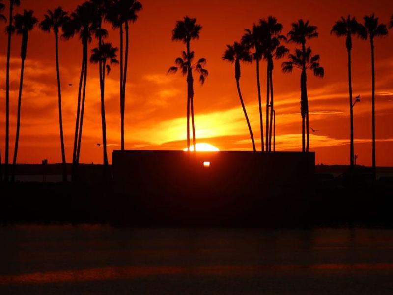 a sunset over a body of water