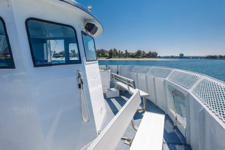 a boat parked next to a body of water