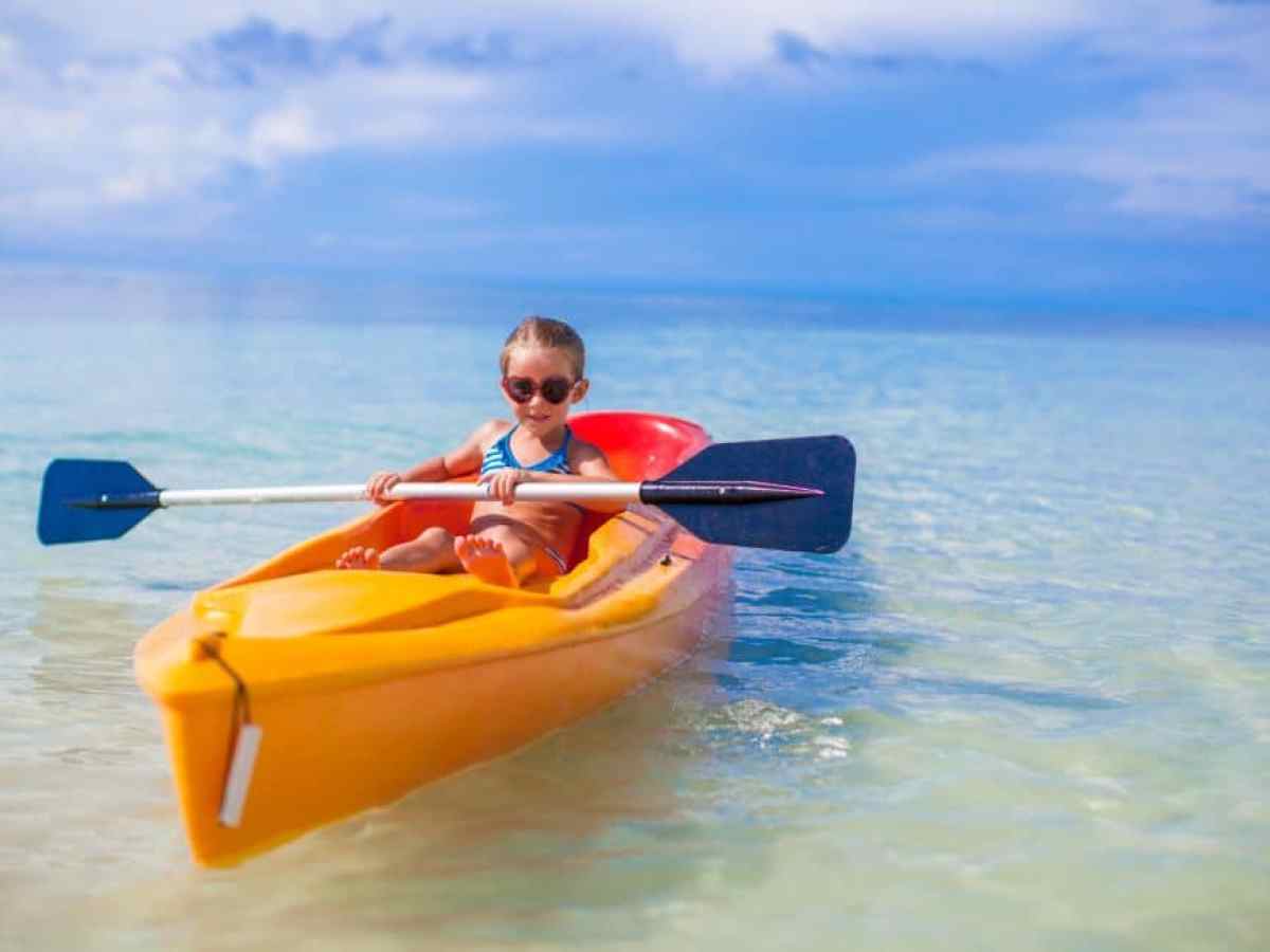 a small boat in a body of water