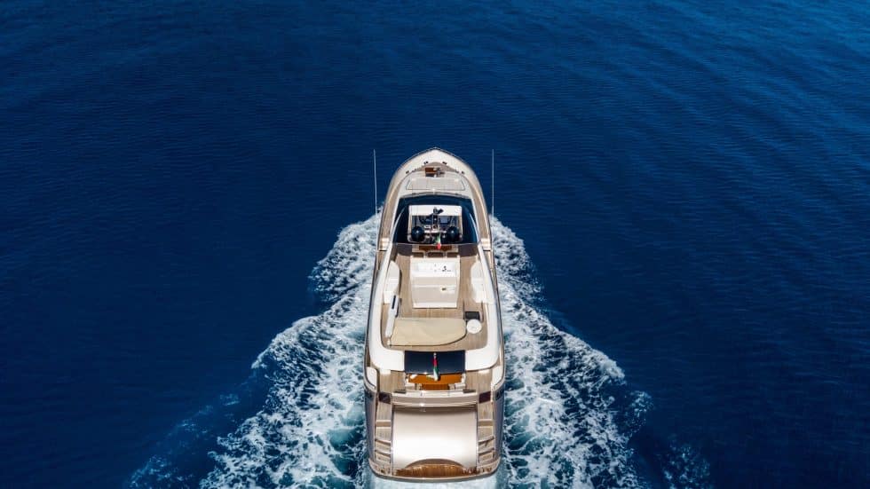 iStock-1438611488-scaled-e1681475840687-980×551 a small boat in a body of water